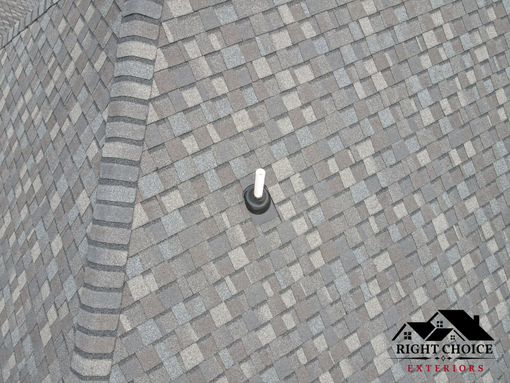 Crew installing a new asphalt shingle roof on an Ohio home